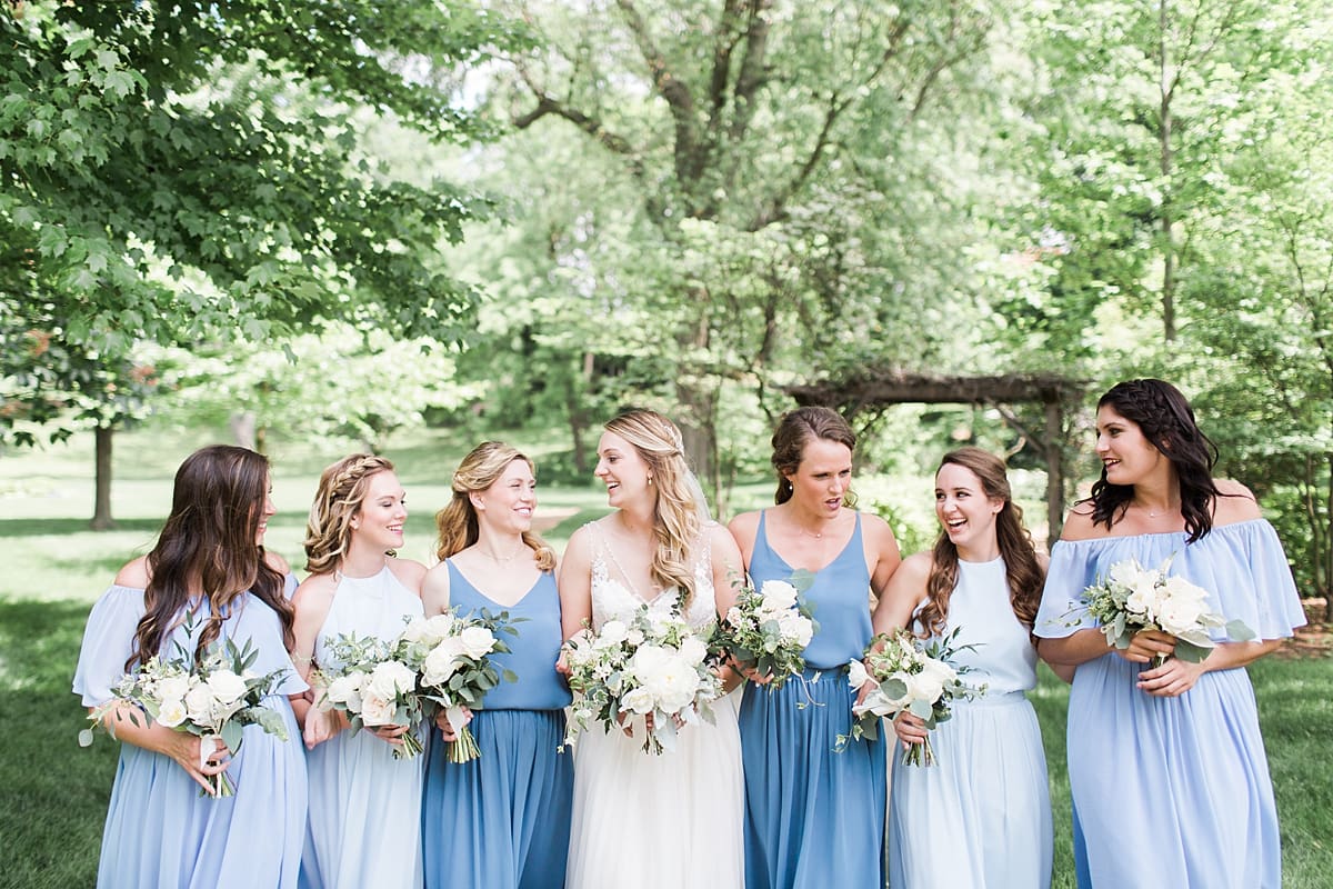 Arielle Peters Photography | Bride and bridesmaids under large trees at home on wedding day in Winona Lake, Indiana. 