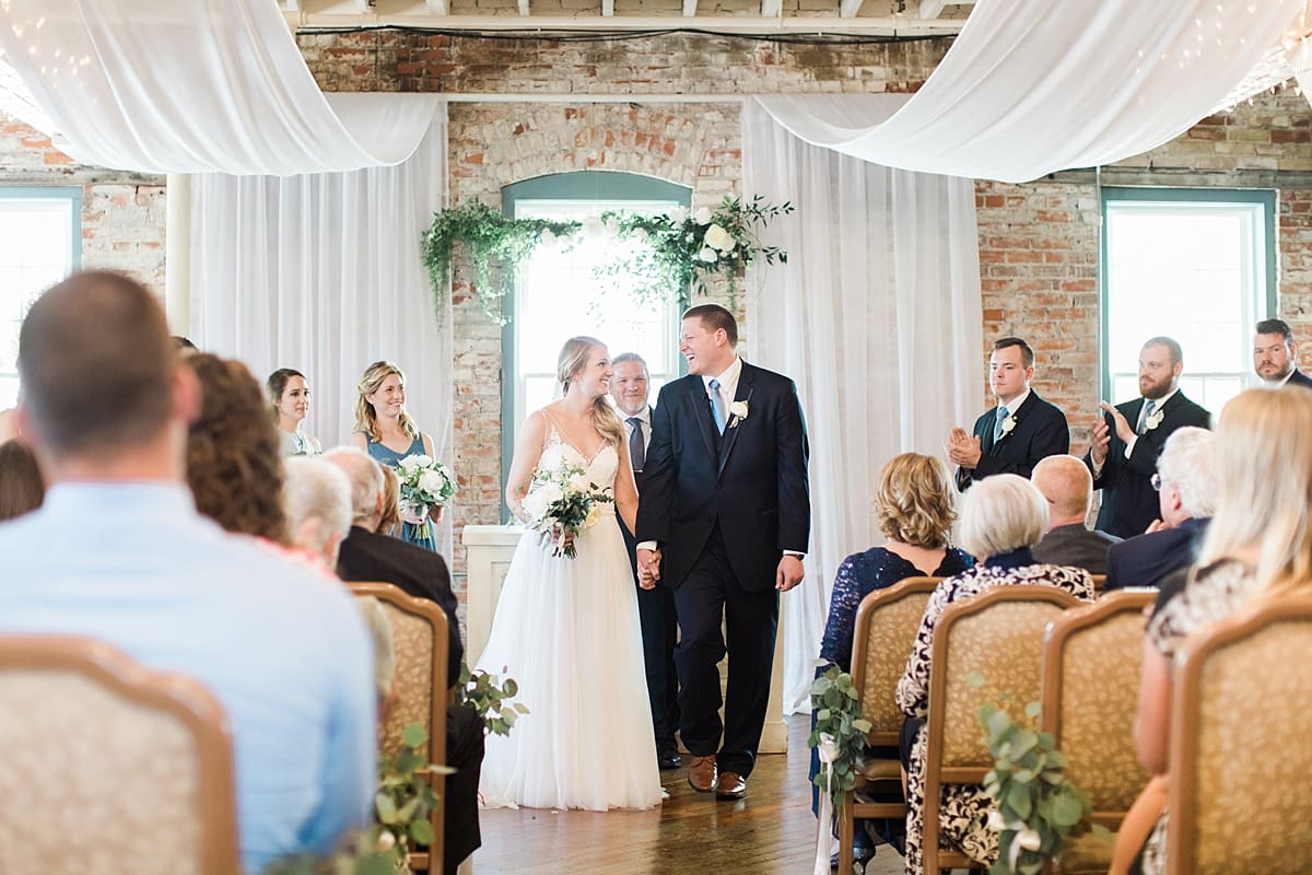 Arielle Peters Photography | Bride and groom walking down the aisle at wedding in Winona Lake, Indiana. 