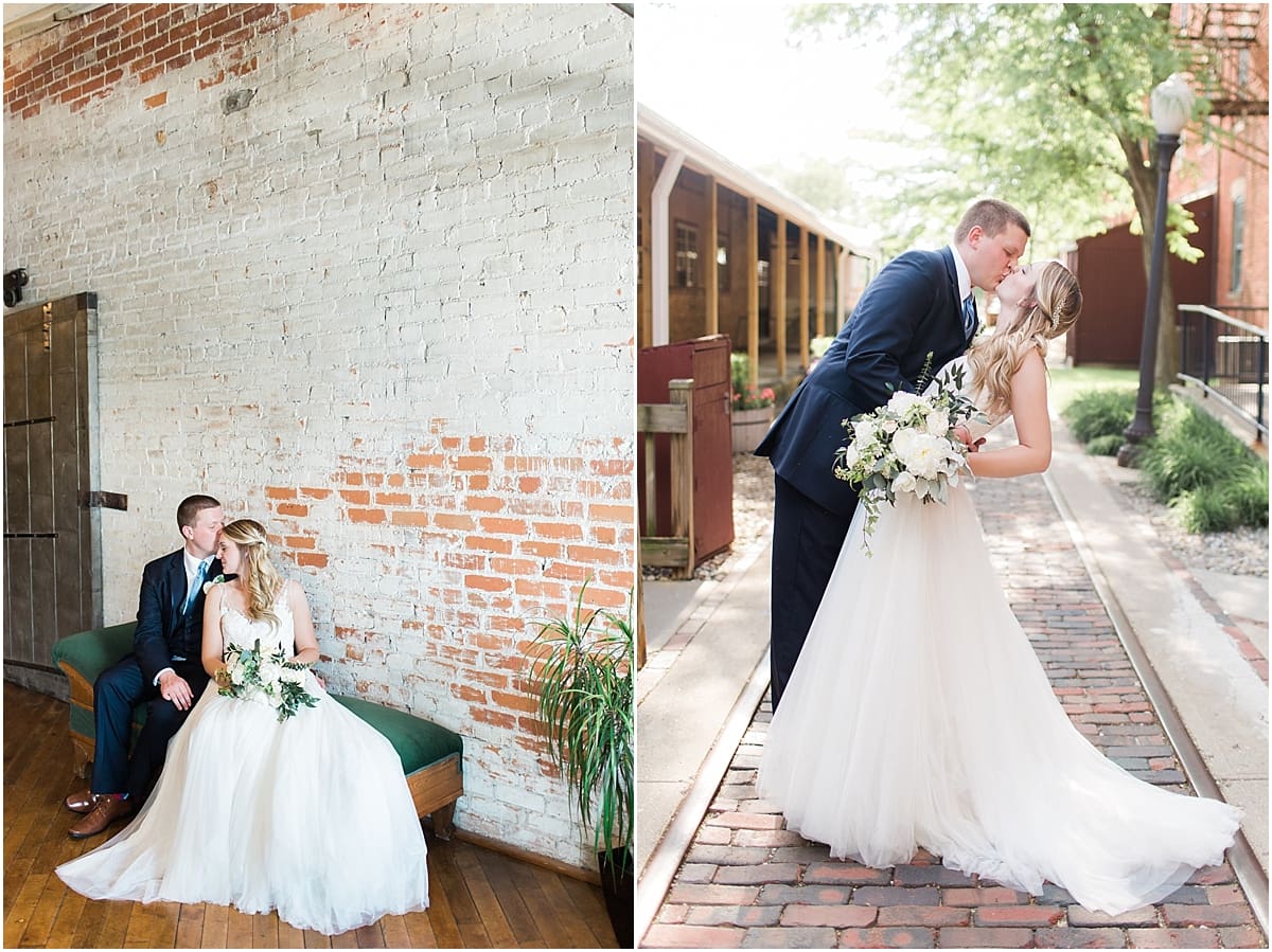 Arielle Peters Photography | Bride and groom kissing by old brick wall on wedding day at Bread & Chocolate in Goshen, Indiana.