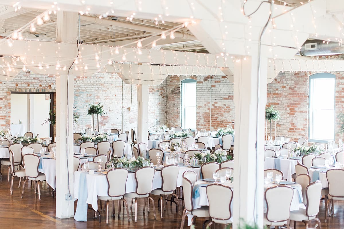 Arielle Peters Photography | Wedding reception table settings and floral arrangements on wedding day at Bread & Chocolate in Goshen, Indiana.