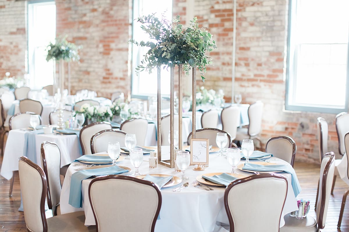 Arielle Peters Photography | Wedding reception table settings and floral arrangements on wedding day at Bread & Chocolate in Goshen, Indiana.