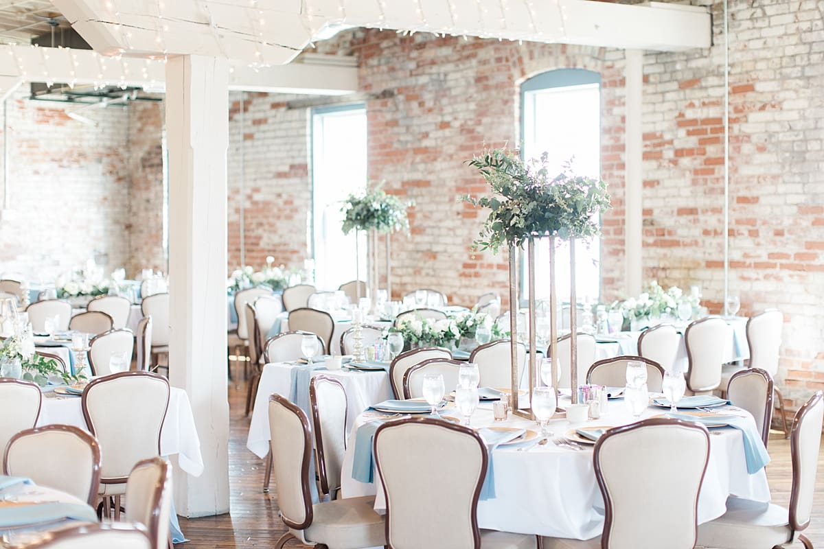 Arielle Peters Photography | Wedding reception table settings and floral arrangements on wedding day at Bread & Chocolate in Goshen, Indiana.