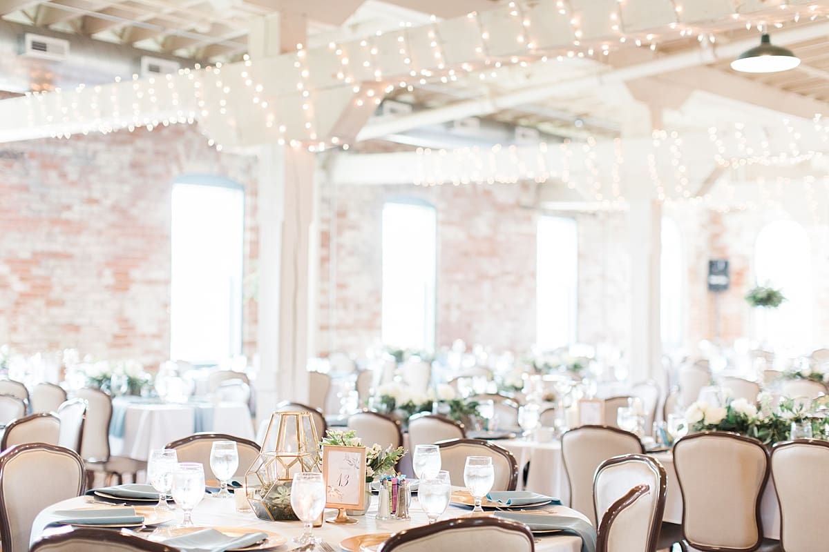 Arielle Peters Photography | Wedding reception table settings and floral arrangements on wedding day at Bread & Chocolate in Goshen, Indiana.