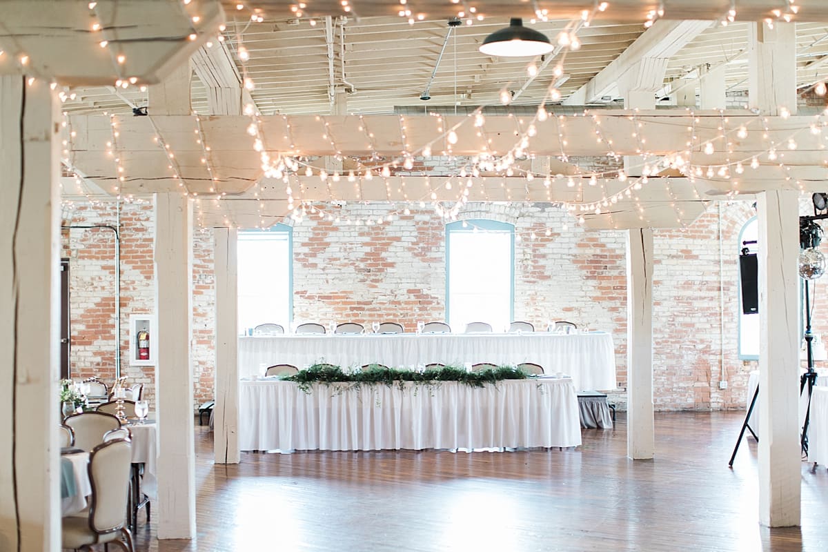 Arielle Peters Photography | Wedding reception table settings and floral arrangements on wedding day at Bread & Chocolate in Goshen, Indiana.