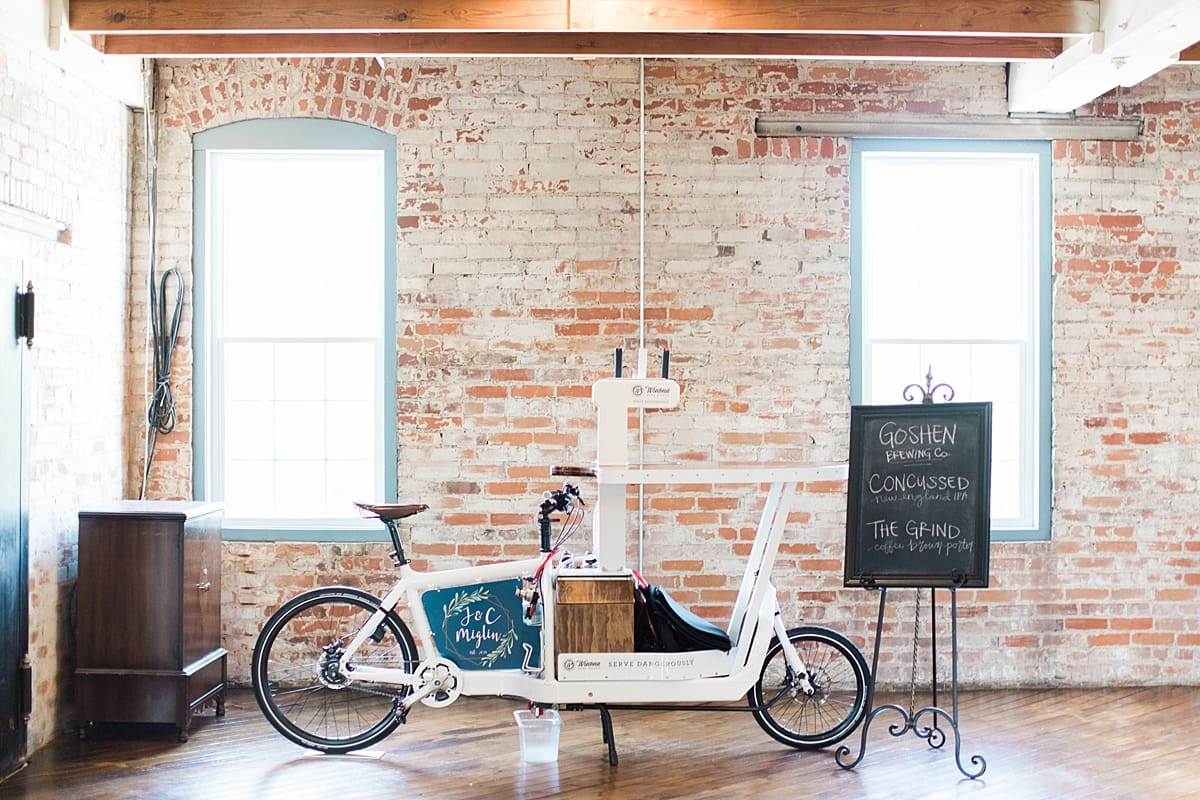 Arielle Peters Photography | Wedding reception table settings and floral arrangements on wedding day at Bread & Chocolate in Goshen, Indiana.