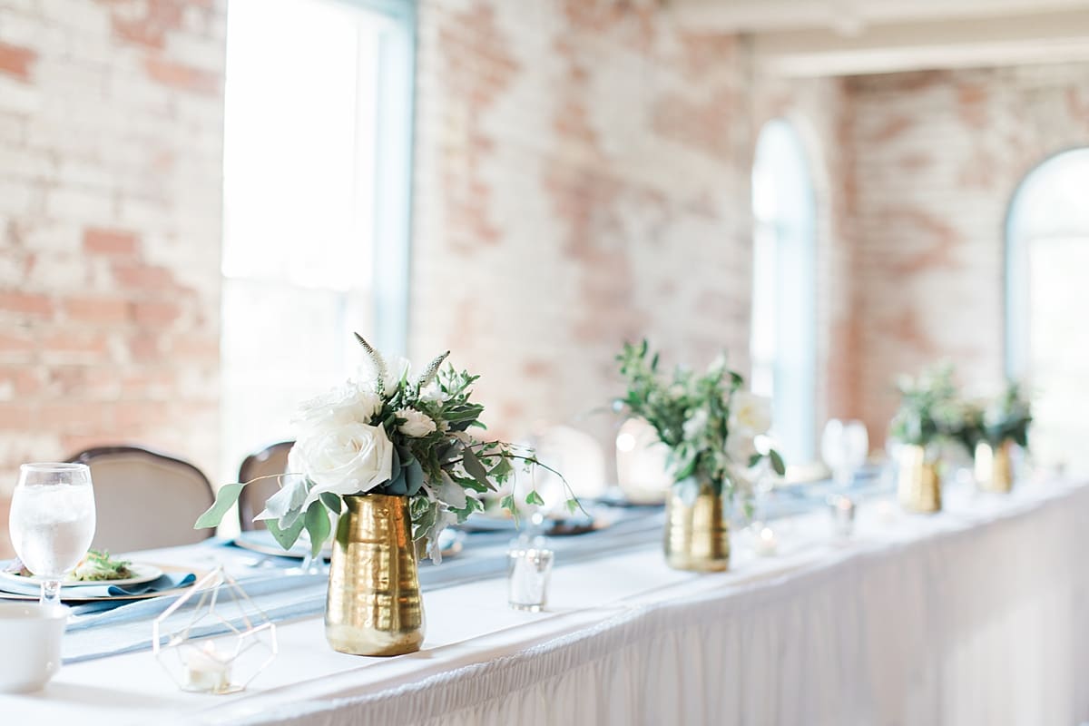 Arielle Peters Photography | Wedding reception table settings and floral arrangements on wedding day at Bread & Chocolate in Goshen, Indiana.