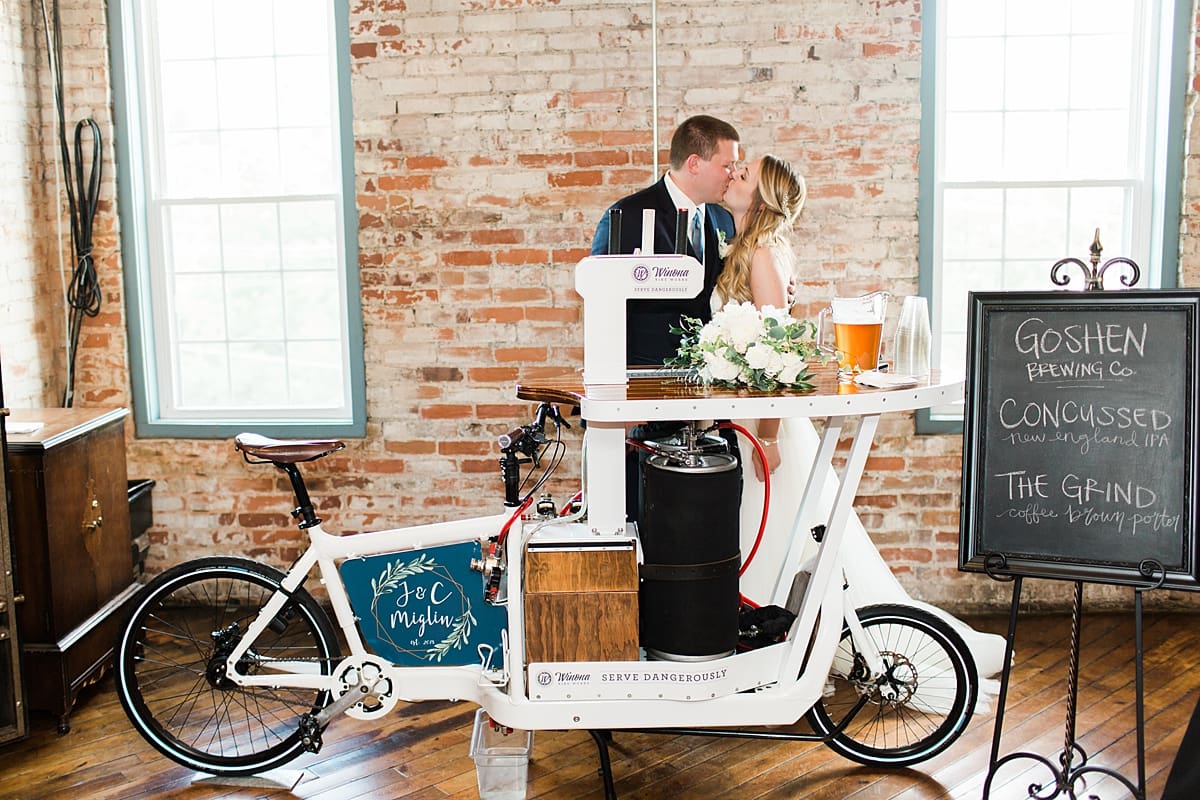 Arielle Peters Photography | Wedding reception table settings and floral arrangements on wedding day at Bread & Chocolate in Goshen, Indiana.