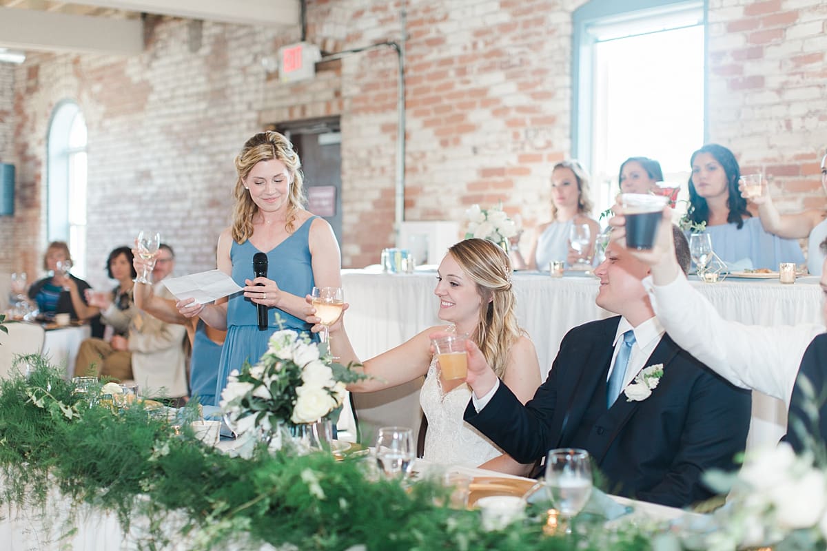 Arielle Peters Photography | Maid of honor giving speech at wedding reception on wedding day at Bread & Chocolate in Goshen, Indiana.