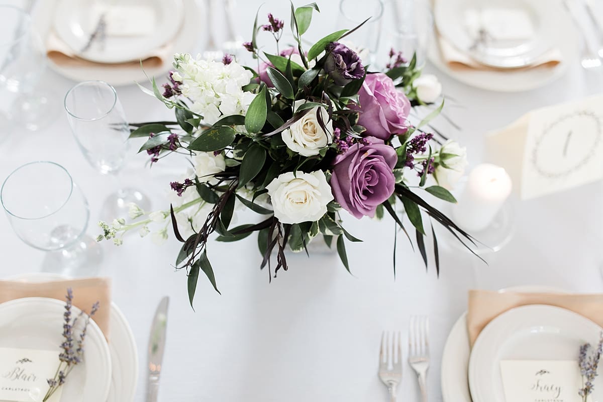  Arielle Peters Photography | Outdoor tent wedding reception table settings and floral arrangements at The Morris Estate in Niles, Michigan.