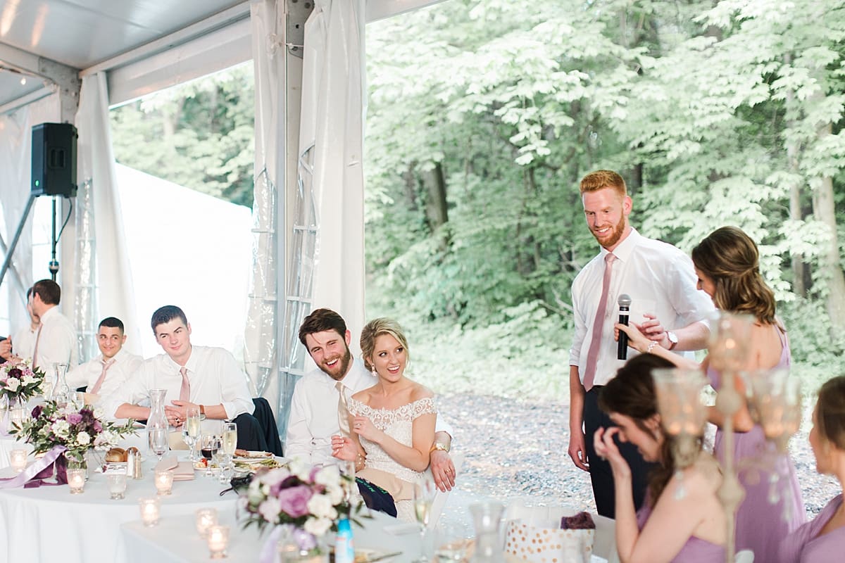  Arielle Peters Photography | Best man giving speech in outdoor tent wedding reception at The Morris Estate in Niles, Michigan.