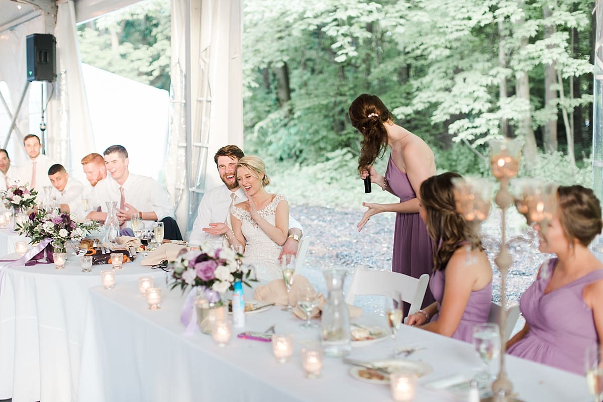  Arielle Peters Photography | Maid of honor giving speech in outdoor tent wedding reception at The Morris Estate in Niles, Michigan.