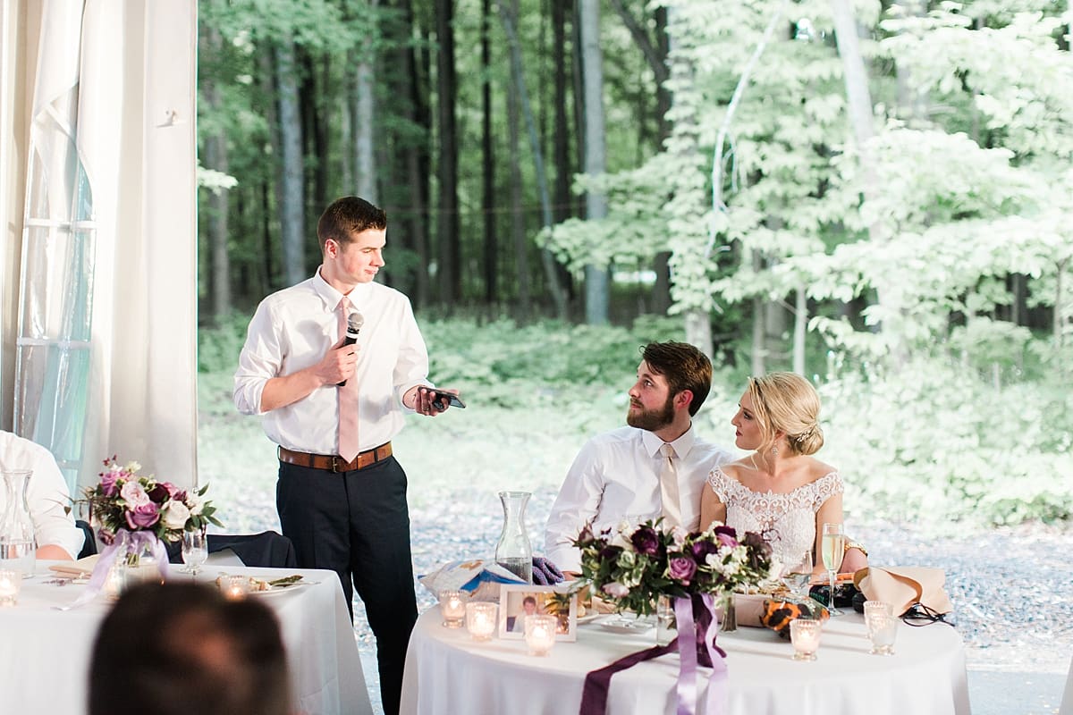  Arielle Peters Photography | Best man giving speech in outdoor tent wedding reception at The Morris Estate in Niles, Michigan.