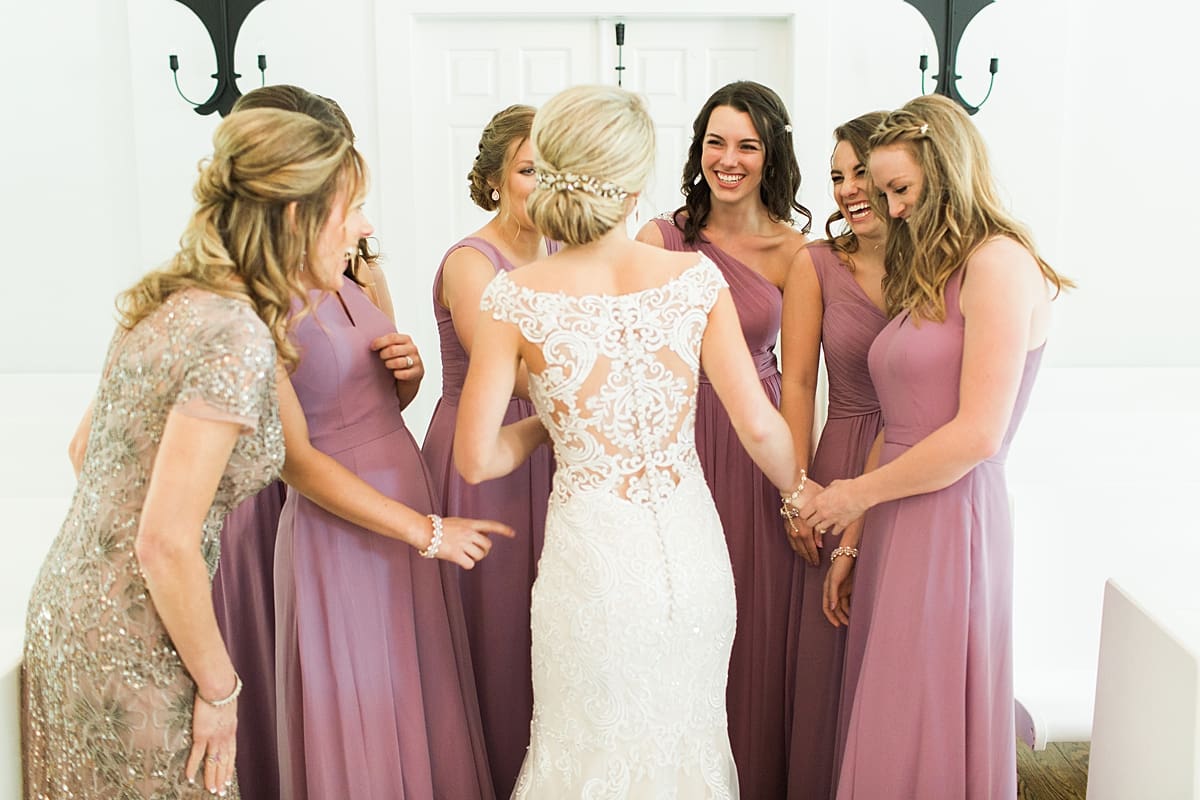  Arielle Peters Photography | Bride and bridesmaids having first reveal on wedding day at The Morris Estate in Niles, Michigan.