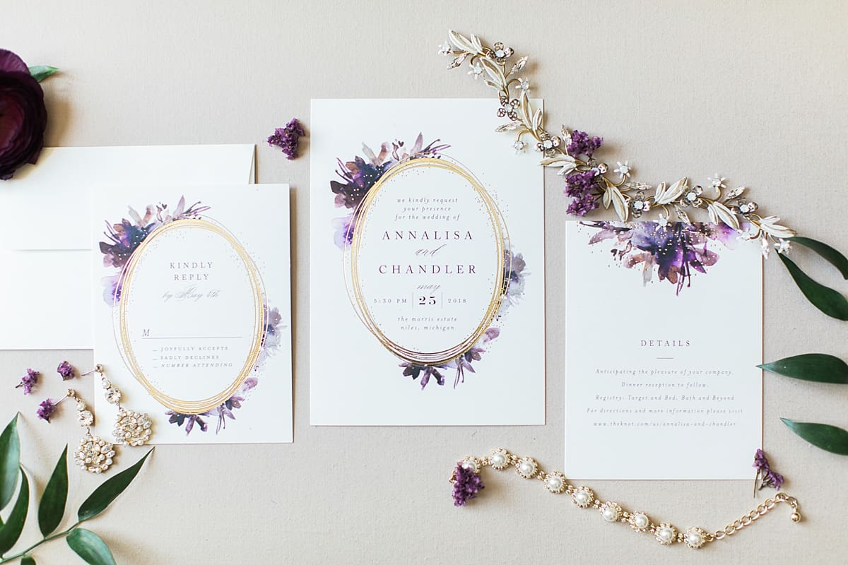 Arielle Peters Photography | Wedding invitation and jewelry displayed on wedding day at The Morris Estate in Niles, Michigan.