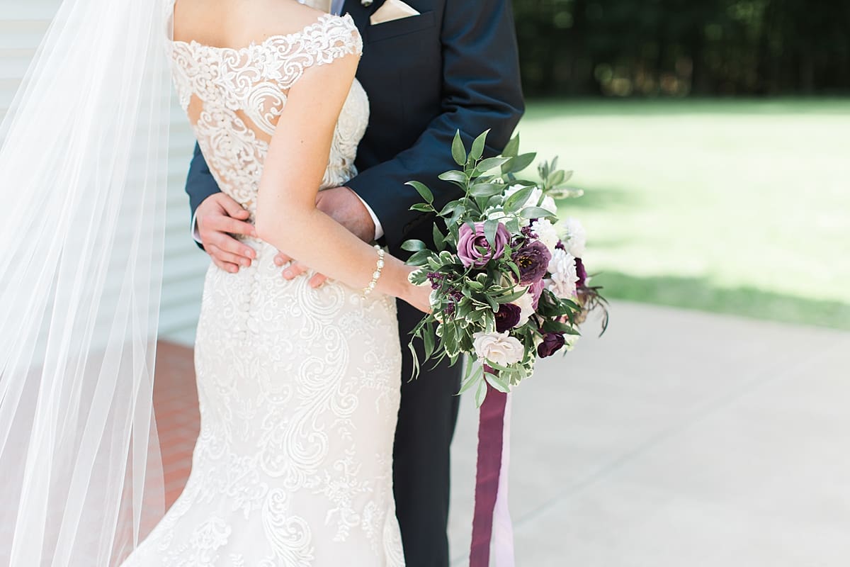  Arielle Peters Photography | Bride and groom outside church steeple on wedding day at The Morris Estate in Niles, Michigan.