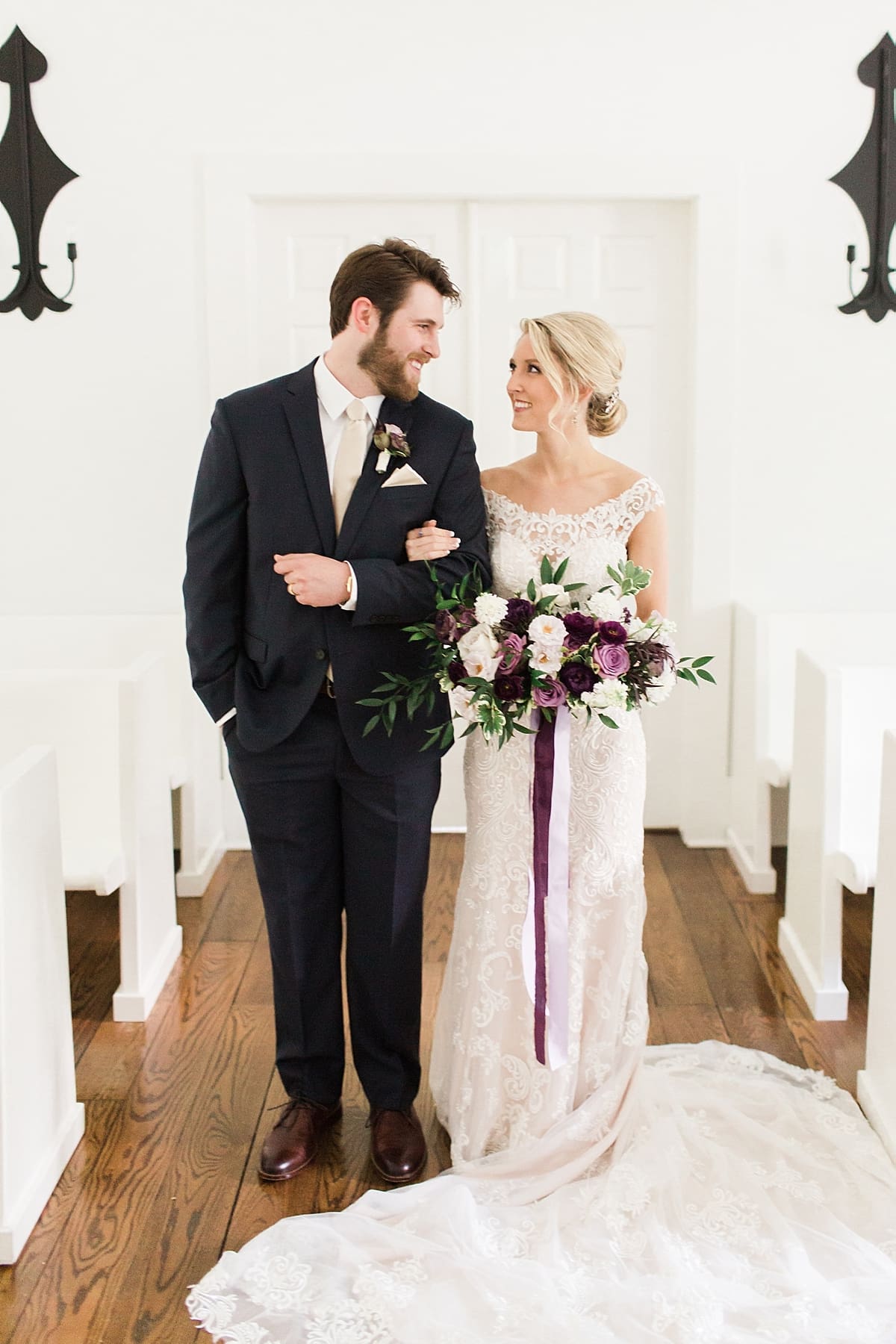  Arielle Peters Photography | Bride and groom inside church on wedding day at The Morris Estate in Niles, Michigan.