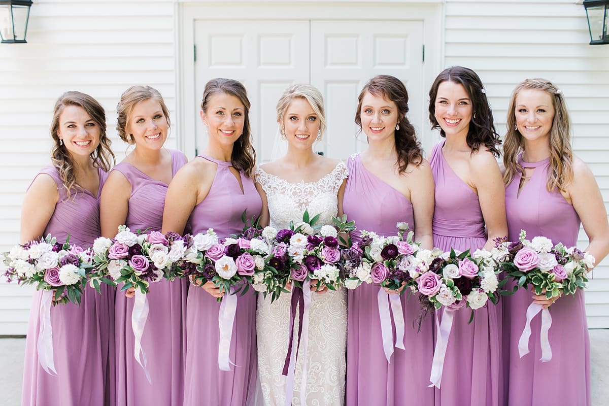  Arielle Peters Photography | Bride and bridesmaids outside church steeple on wedding day at The Morris Estate in Niles, Michigan.