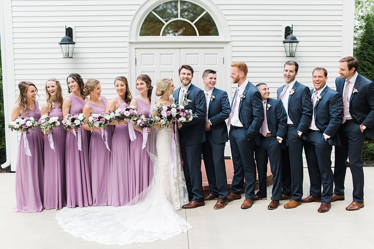  Arielle Peters Photography | Wedding party in front of french doors on wedding day at The Morris Estate in Niles, Michigan.
