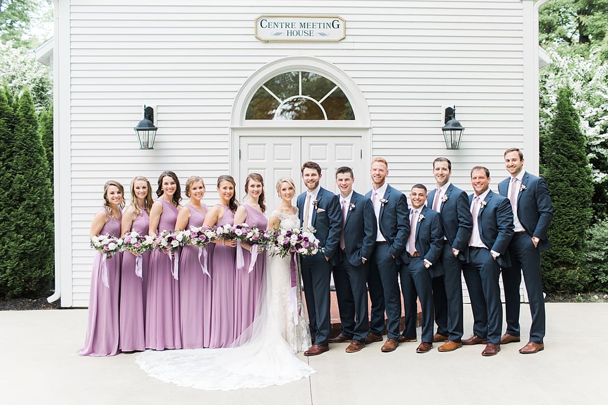 Arielle Peters Photography | Wedding party in front of church doors on wedding day at The Morris Estate in Niles, Michigan.