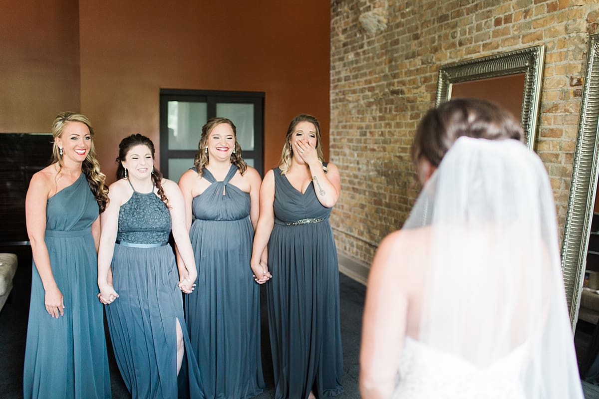 Arielle Peters Photography | Bride and bridesmaids having first reveal on wedding day at The Allure in LaPorte, Indiana.