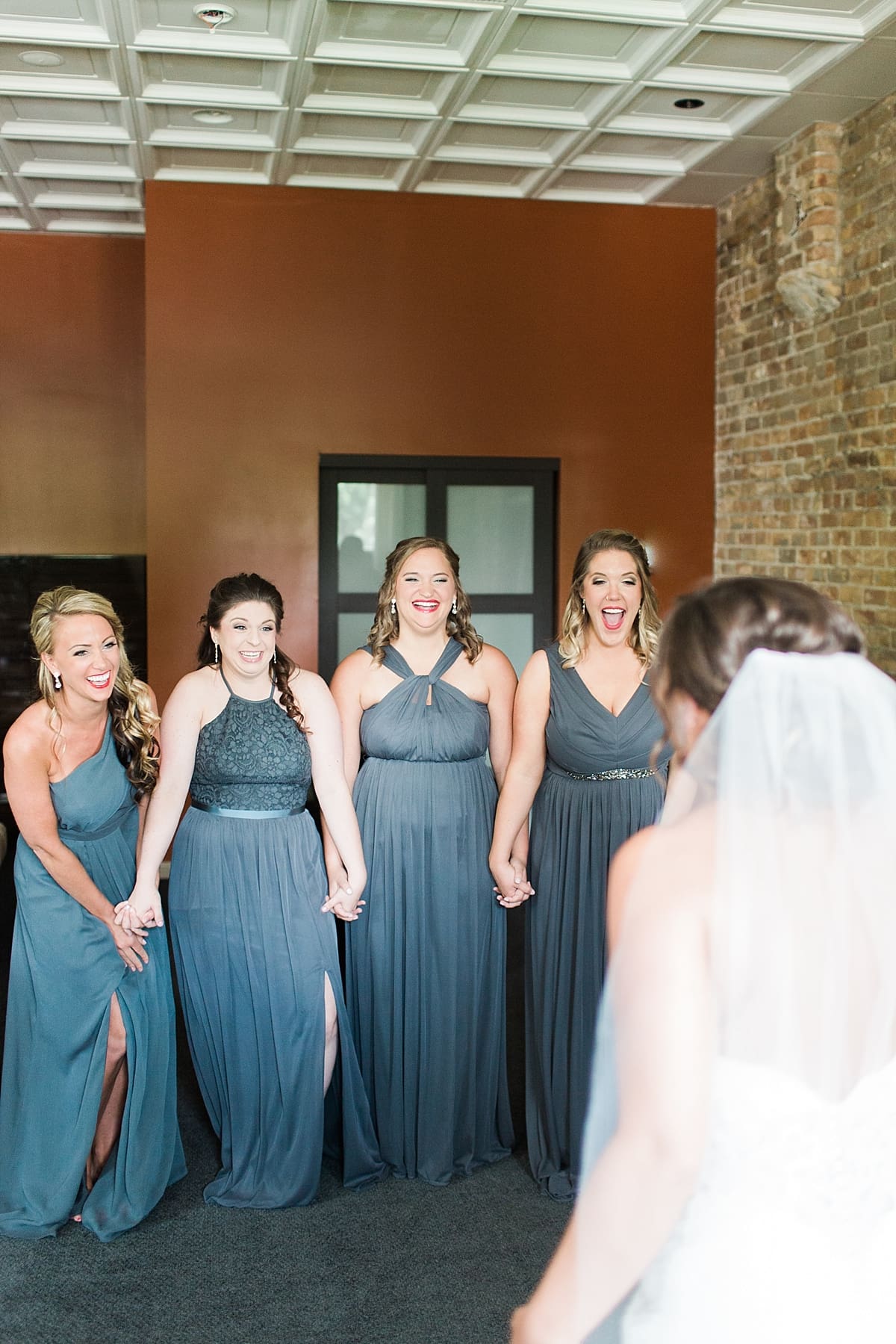 Arielle Peters Photography | Bride and bridesmaids having first reveal on wedding day at The Allure in LaPorte, Indiana.