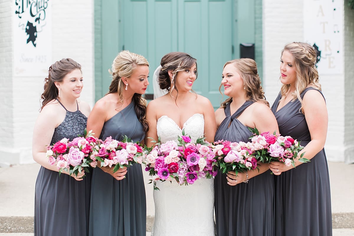 Arielle Peters Photography | Bride and bridesmaids in front of turquoise doors at The Allure in LaPorte, Indiana on wedding day.