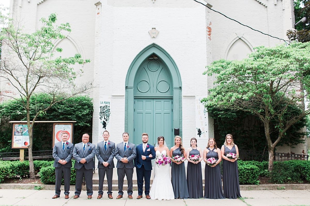 Arielle Peters Photography | Wedding party in front of turquoise doors at The Allure in LaPorte, Indiana on wedding day.