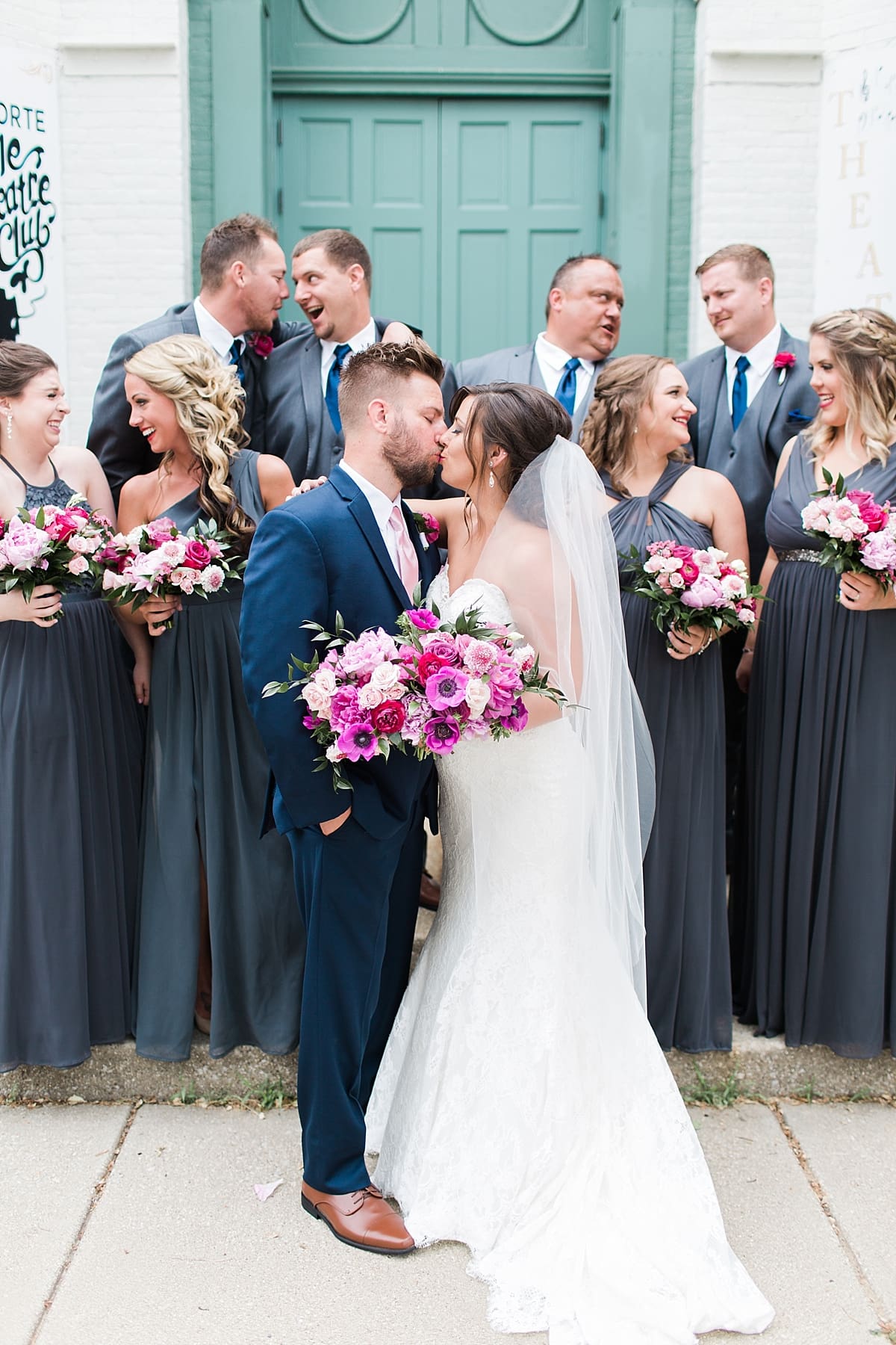 Arielle Peters Photography | Wedding party in front of turquoise doors at The Allure in LaPorte, Indiana on wedding day.