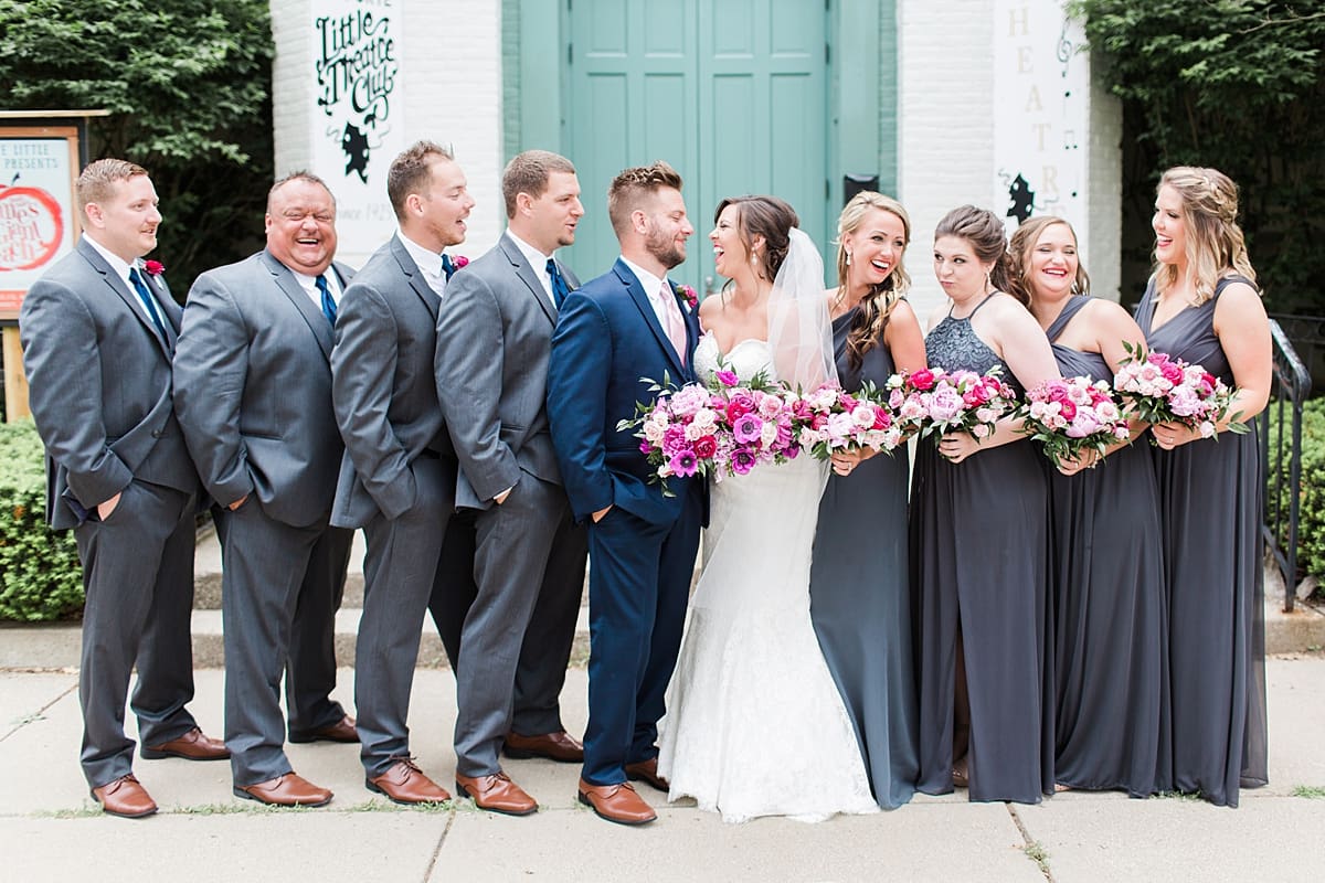 Arielle Peters Photography | Wedding party in front of turquoise doors at The Allure in LaPorte, Indiana on wedding day.