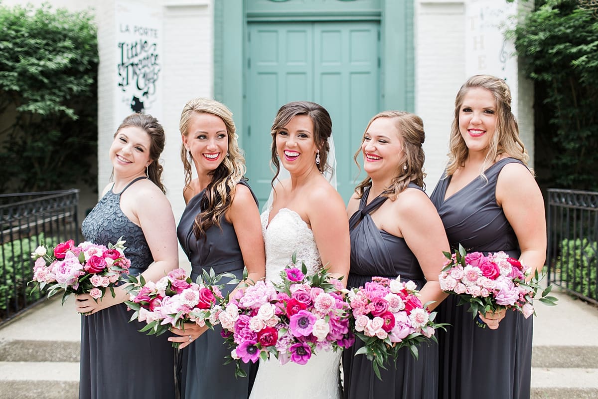 Arielle Peters Photography | Wedding party in front of turquoise doors at The Allure in LaPorte, Indiana on wedding day.