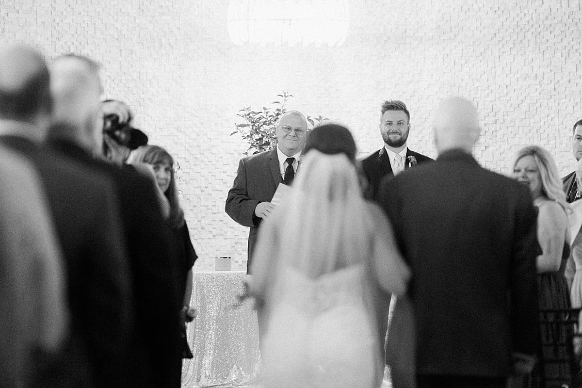 Arielle Peters Photography | Father of bride walking bride down aisle during wedding at The Allure in LaPorte, Indiana on wedding day.
