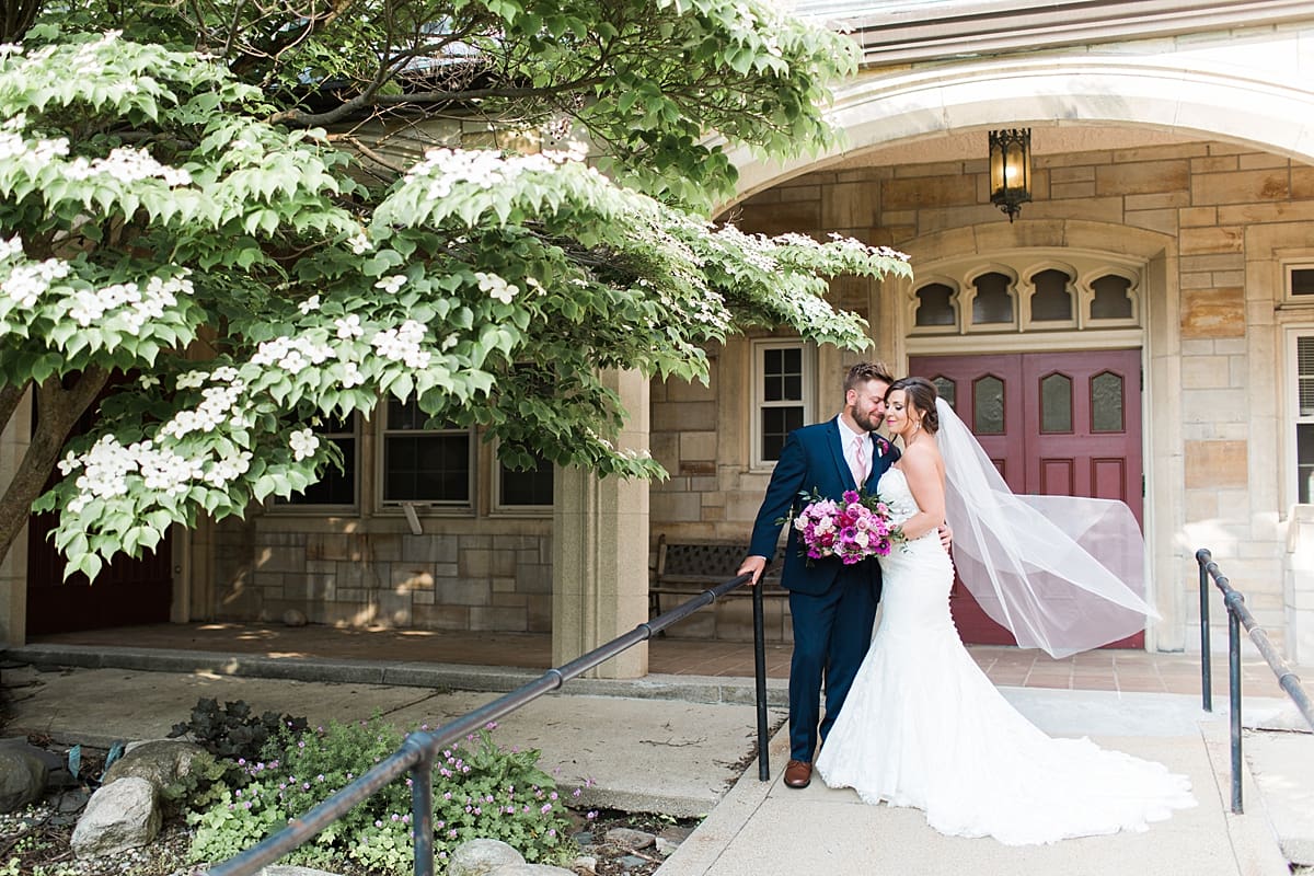 Arielle Peters Photography | Bride and groom outside historic building at The Allure in LaPorte, Indiana on wedding day.