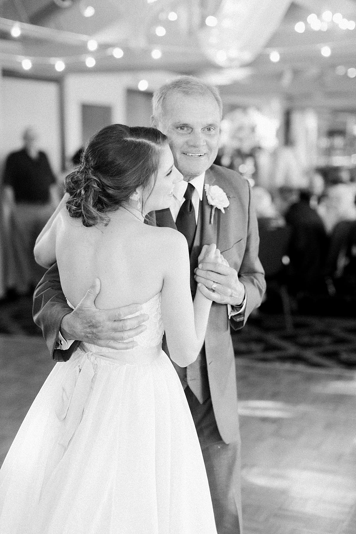 Arielle Peters Photography | Father of bride and bride sharing dance at wedding reception on wedding day at Morris Park Country Club in South Bend, Indiana.