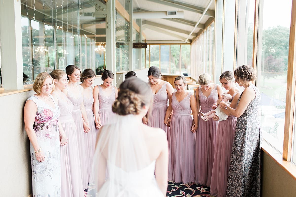 Arielle Peters Photography | Bride and bridesmaids having first reveal on wedding day at Morris Park Country Club in South Bend, Indiana.