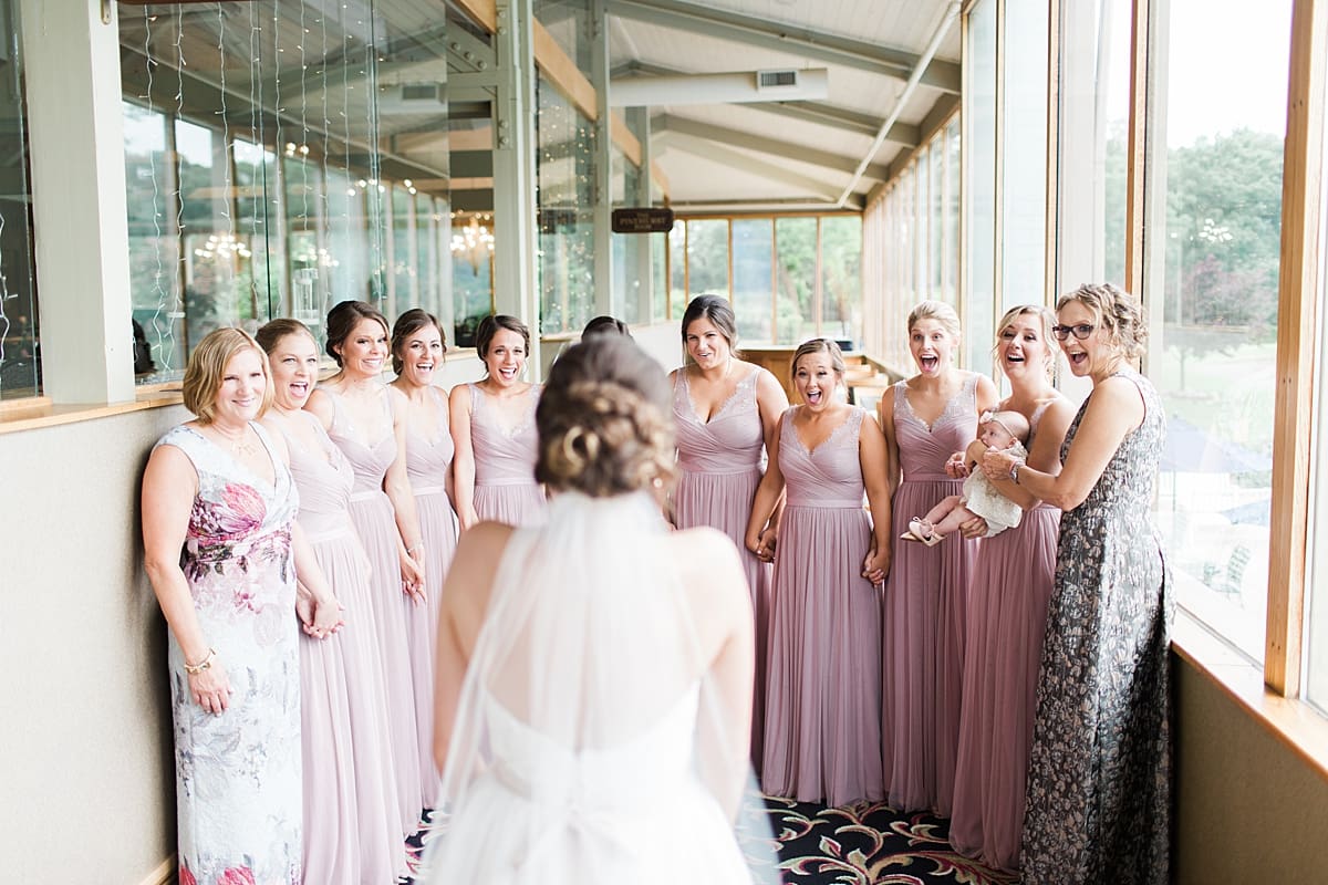 Arielle Peters Photography | Bride and bridesmaids having first reveal on wedding day at Morris Park Country Club in South Bend, Indiana.