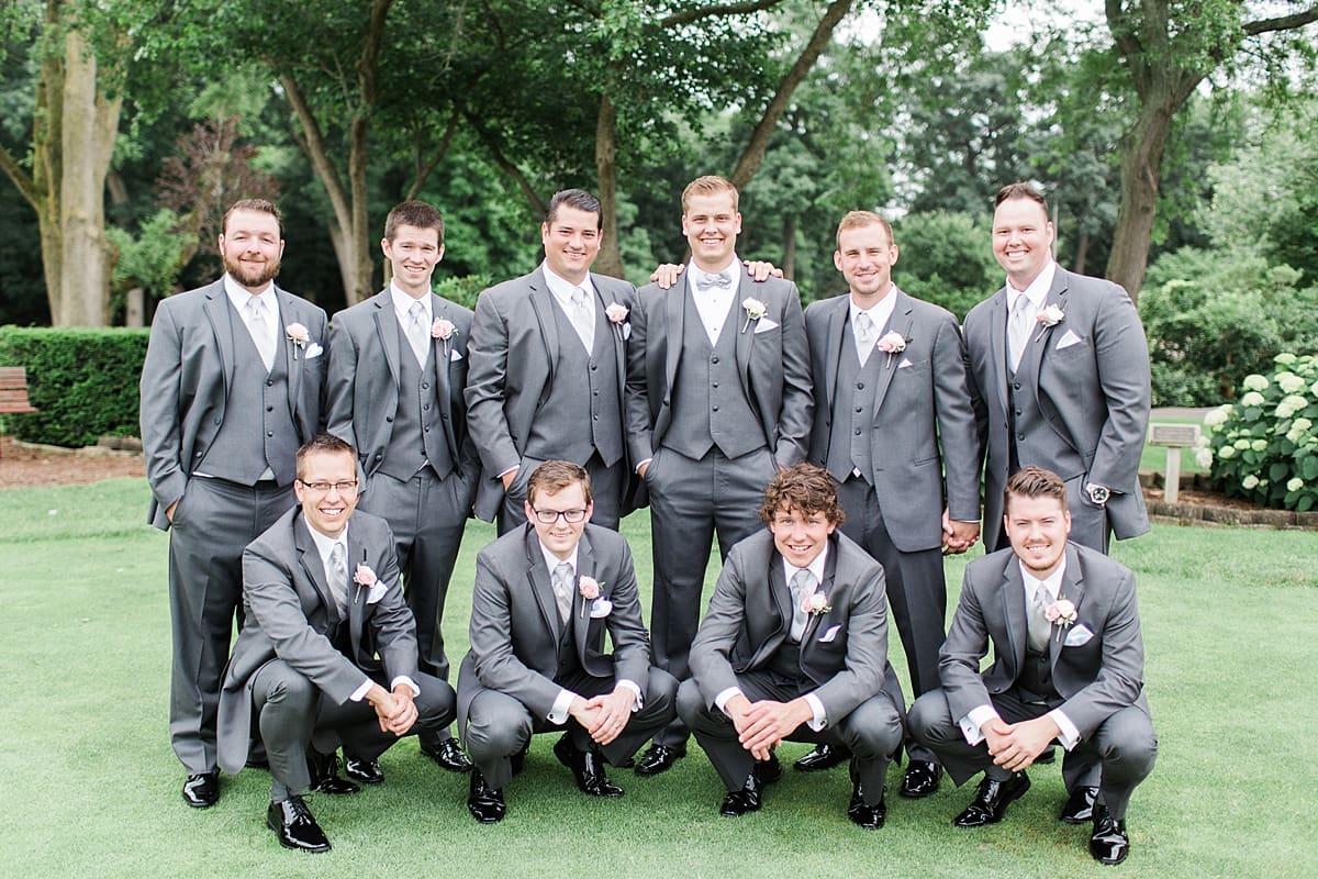Arielle Peters Photography | Groom and groomsmen on golf course on wedding day at Morris Park Country Club in South Bend, Indiana.