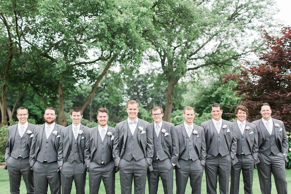 Arielle Peters Photography | Groom and groomsmen on golf course on wedding day at Morris Park Country Club in South Bend, Indiana.