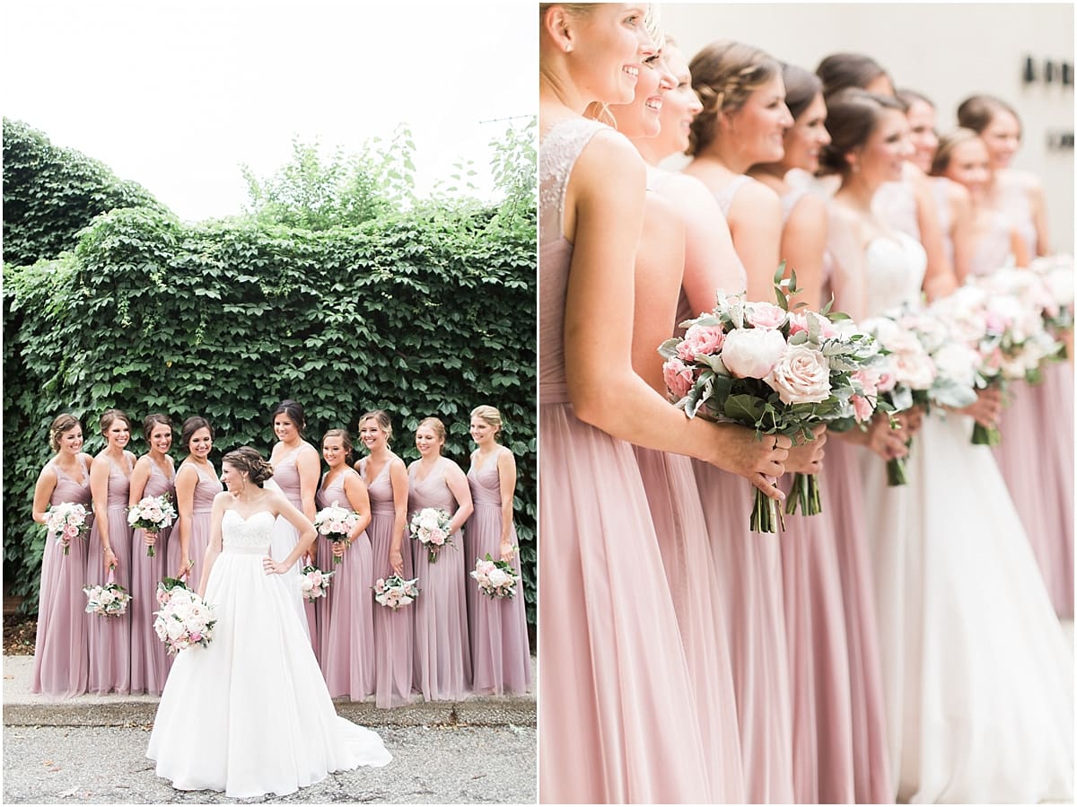 Arielle Peters Photography | Bride and bridesmaids by ivy-covered wall on wedding day at Morris Park Country Club in South Bend, Indiana.