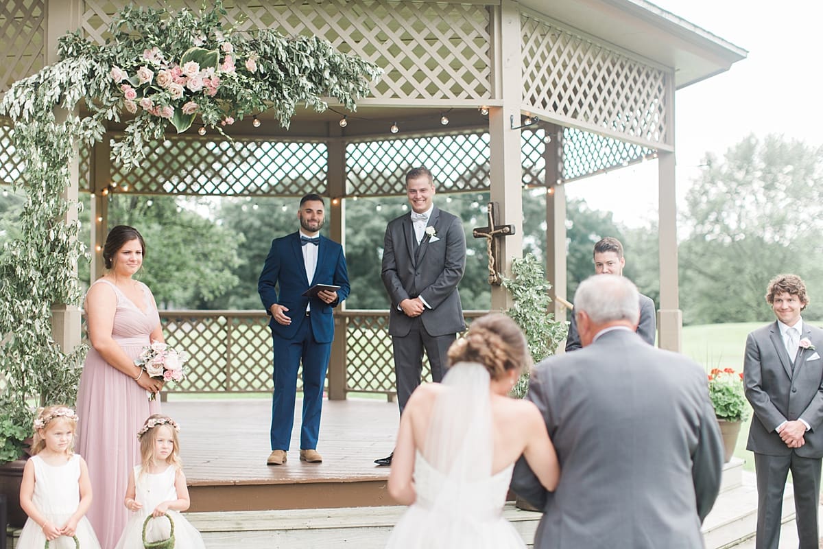 Arielle Peters Photography | Father of bride walking bride down aisle on wedding day at Morris Park Country Club in South Bend, Indiana.