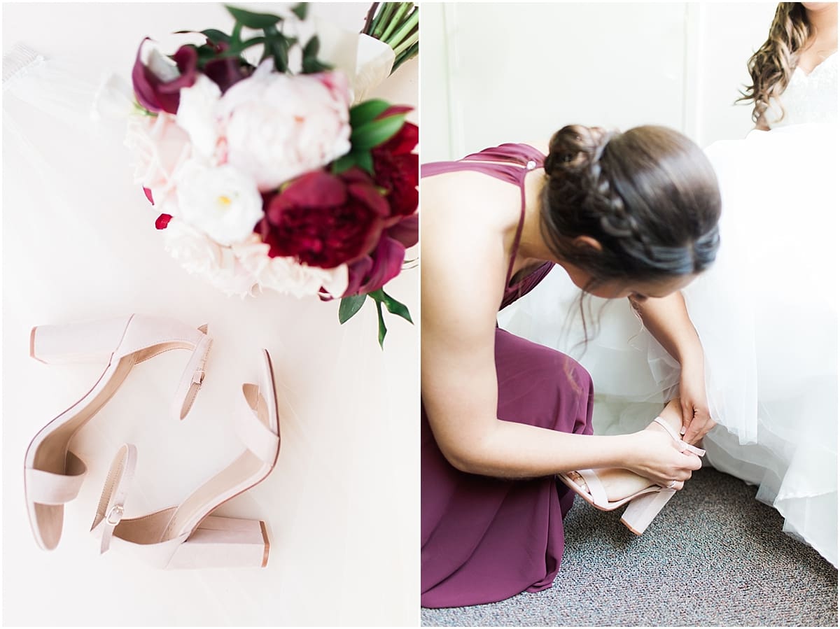 Arielle Peters Photography | Sister of bride helping put on bride's shoes on wedding day at Trinity Church in South Bend, Indiana.
