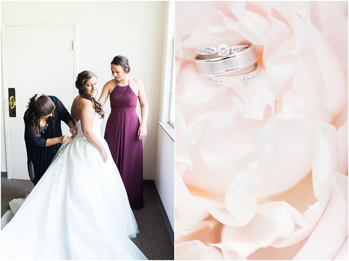 Arielle Peters Photography | Mother of the bride helping bride put on wedding dress on wedding day at Trinity Church in South Bend, Indiana.