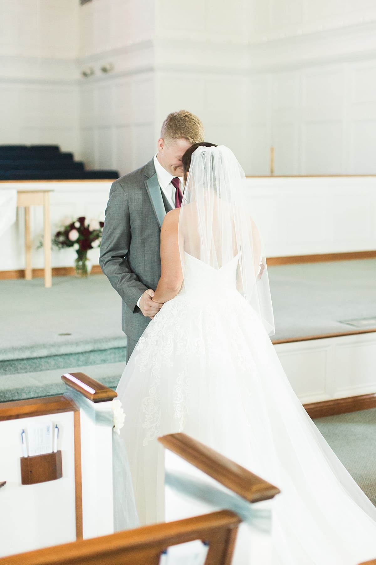 Arielle Peters Photography | Bride and groom having first reveal on wedding day at Trinity Church in South Bend, Indiana.