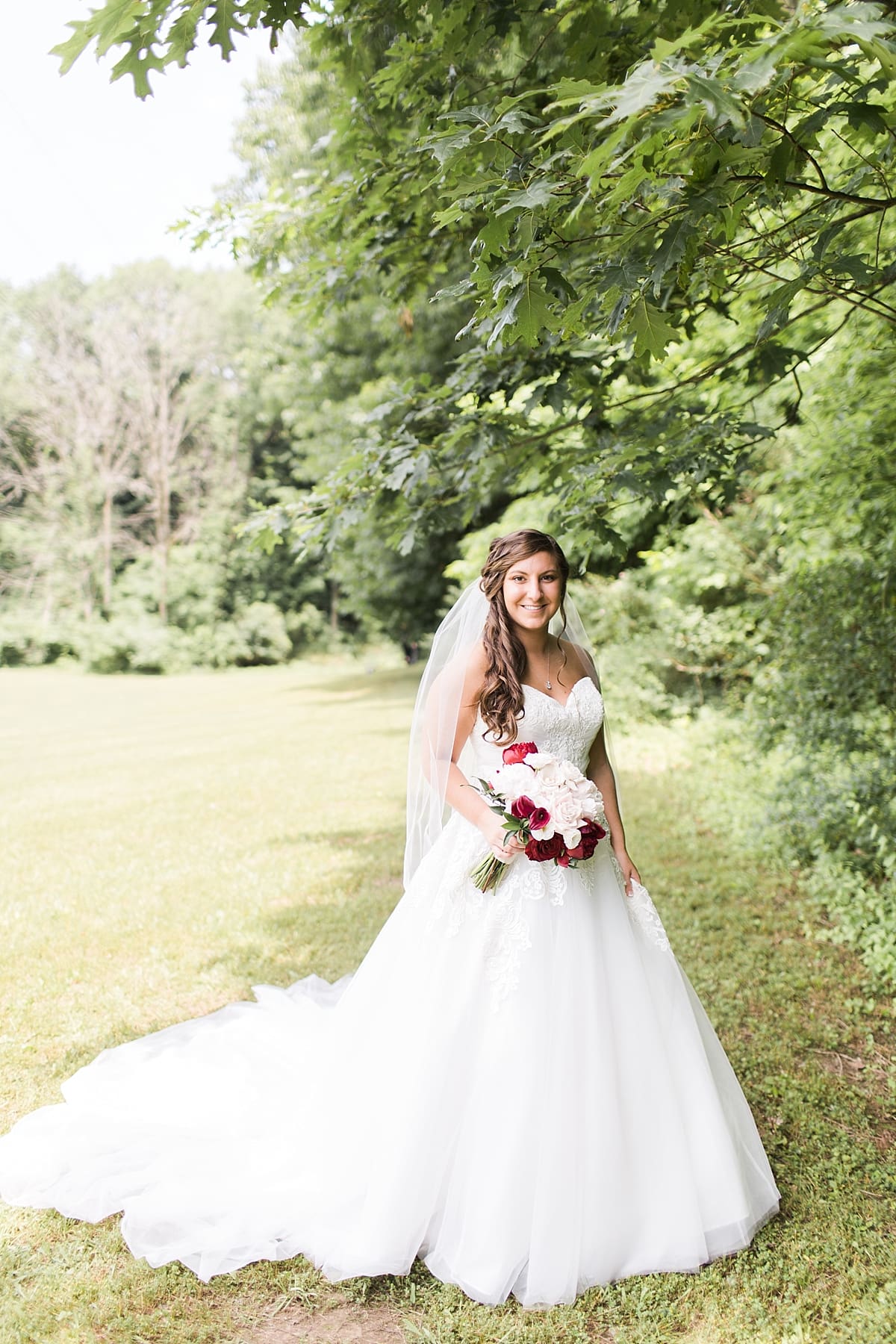 Arielle Peters Photography | Bride outside on wedding day at Trinity Church in South Bend, Indiana.