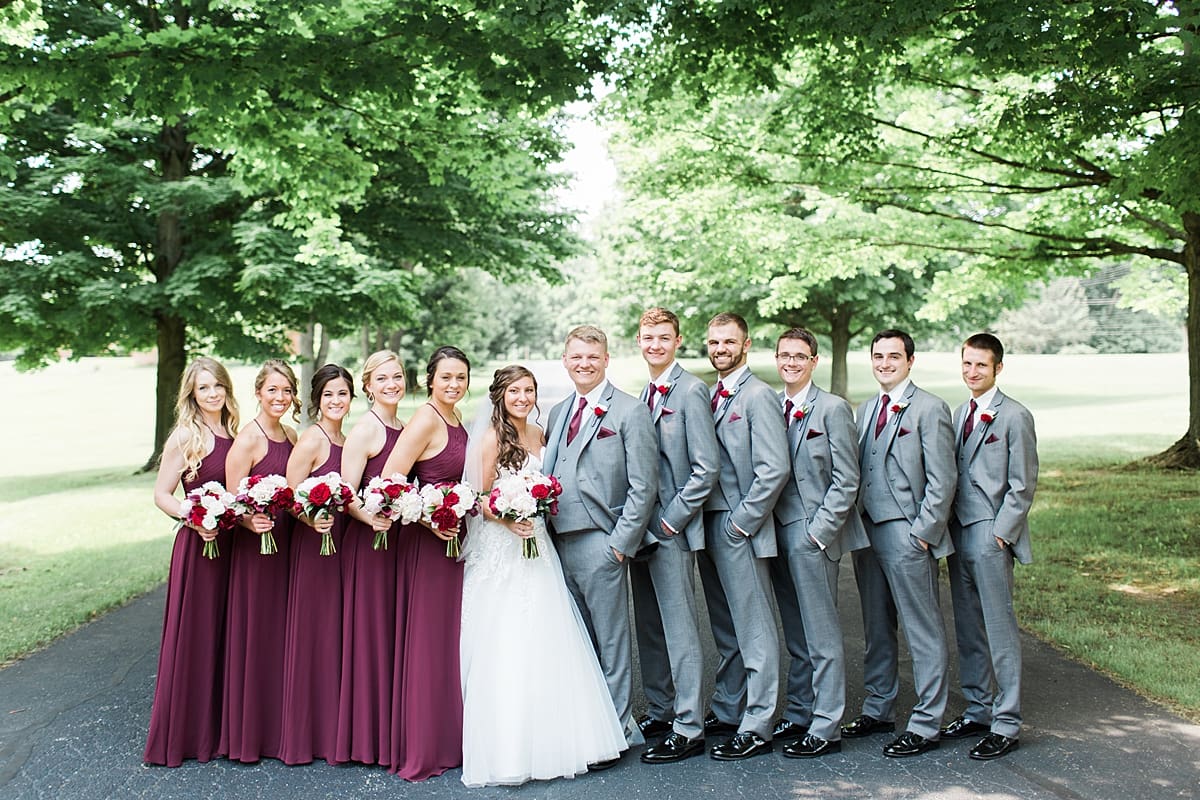 Arielle Peters Photography | Wedding party on empty street on wedding day at Trinity Church in South Bend, Indiana.