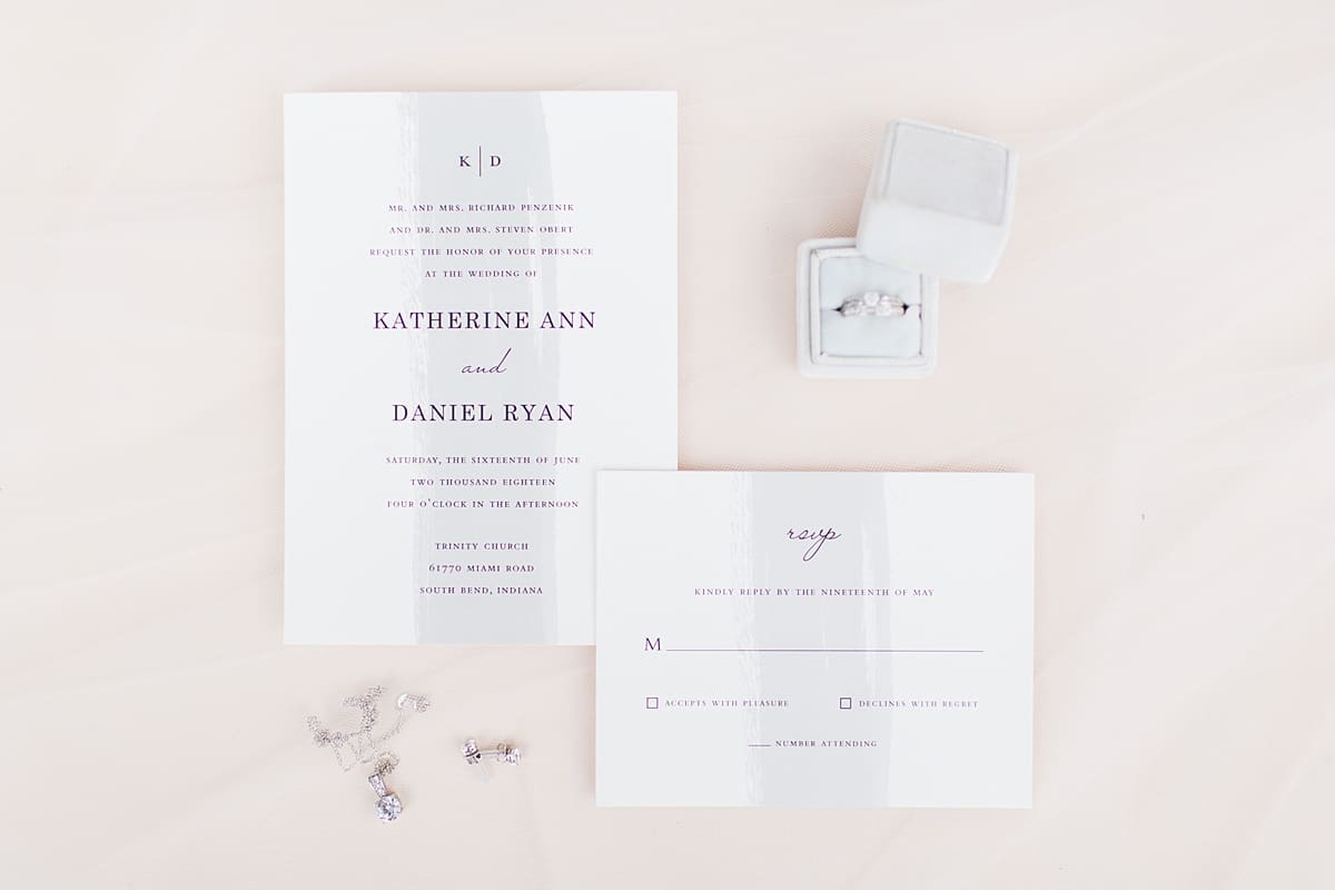 Arielle Peters Photography | Wedding invitations and rings on wedding day at Trinity Church in South Bend, Indiana.