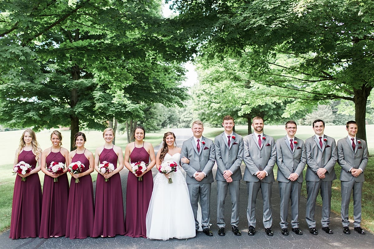 Arielle Peters Photography | Wedding party on empty street on wedding day at Trinity Church in South Bend, Indiana.