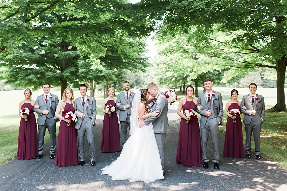 Arielle Peters Photography | Wedding party on empty street on wedding day at Trinity Church in South Bend, Indiana.