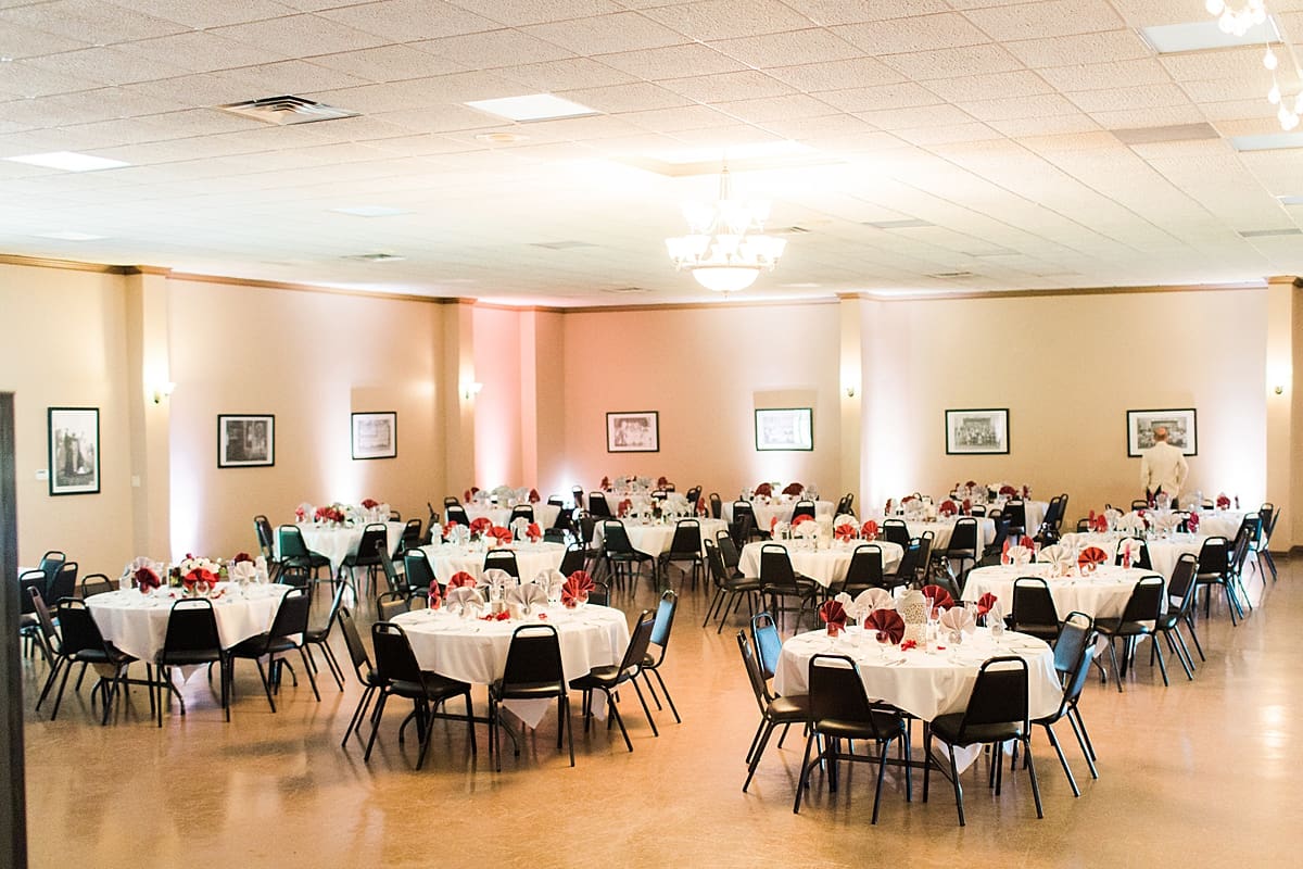Arielle Peters Photography | Wedding reception table settings and floral arrangements at Sts. Peter and Paul Social Hall in South Bend, Indiana.