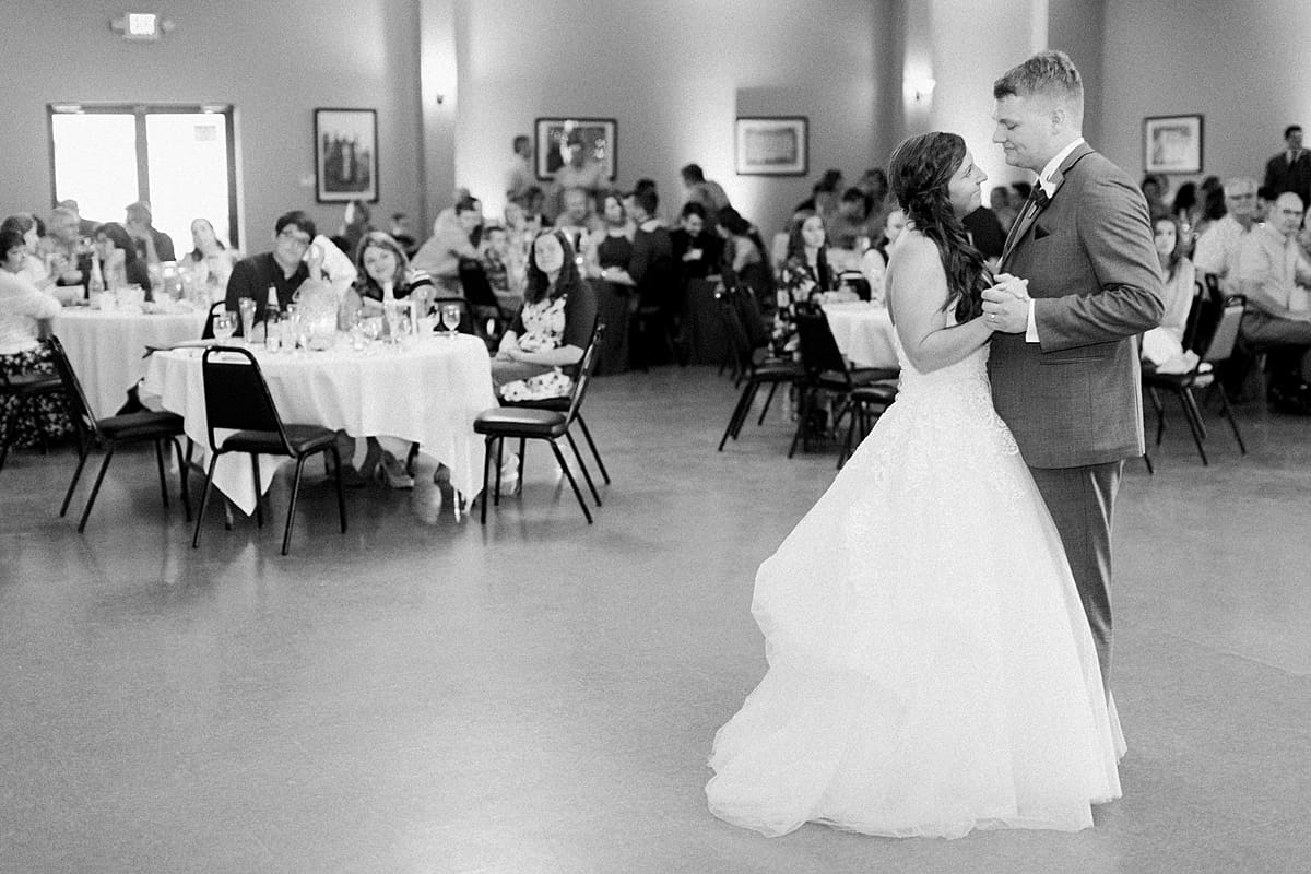 Arielle Peters Photography | Bride and groom sharing first dance at wedding reception at Sts. Peter and Paul Social Hall in South Bend, Indiana.