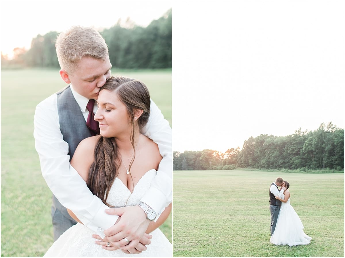 Arielle Peters Photography | Bride and groom kissing in open field on wedding day at Sts. Peter and Paul Social Hall in South Bend, Indiana.